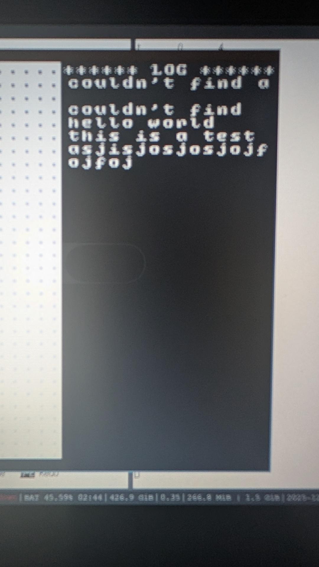 A photo of my laptop screen with a bunch of error messages from my CLI trying to load non-existent files. A super long test message is wrapped word by word. If a word is too long it's written to the next line. Words that still don't fit just overflow wrapping at 15 characters wide.